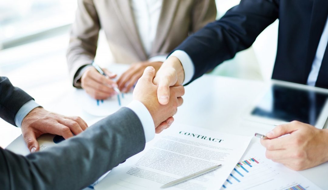 Clients working with a mortgage broker in Portugal to secure financing.